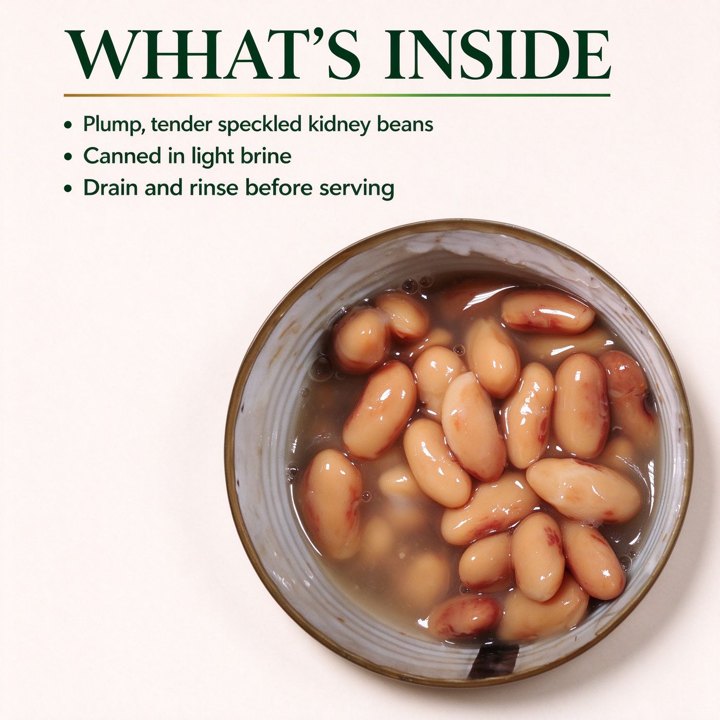 An opened tin of plump speckled kidney beans in brine, seen from above
