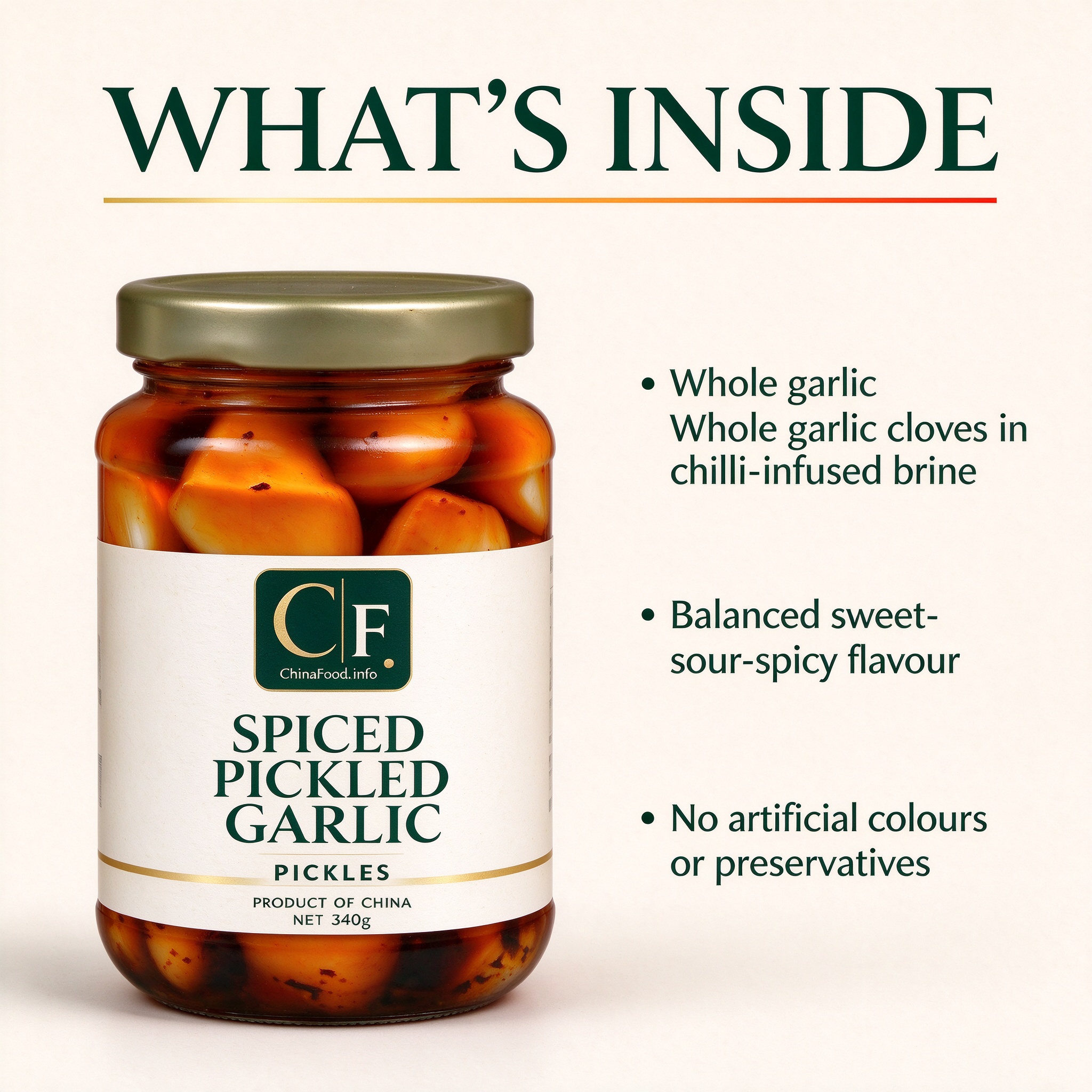 A glass jar of whole pickled garlic cloves in chilli-infused brine