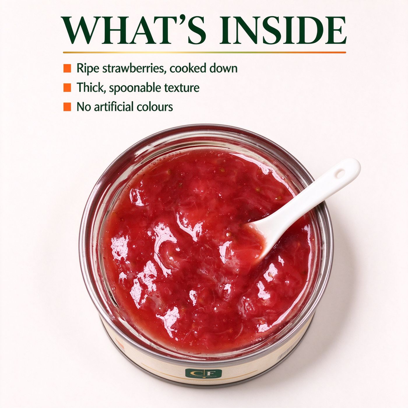 An open tin of strawberry jam with a spoon, seen from above